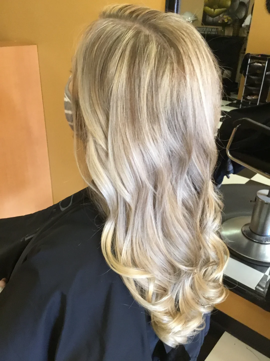Long Blonde Foiled Highlights Colouring with Natural Curls Cut & Style
